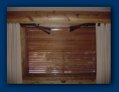 Rifles as curtain rods